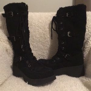Mid calf black boots. Size US 7